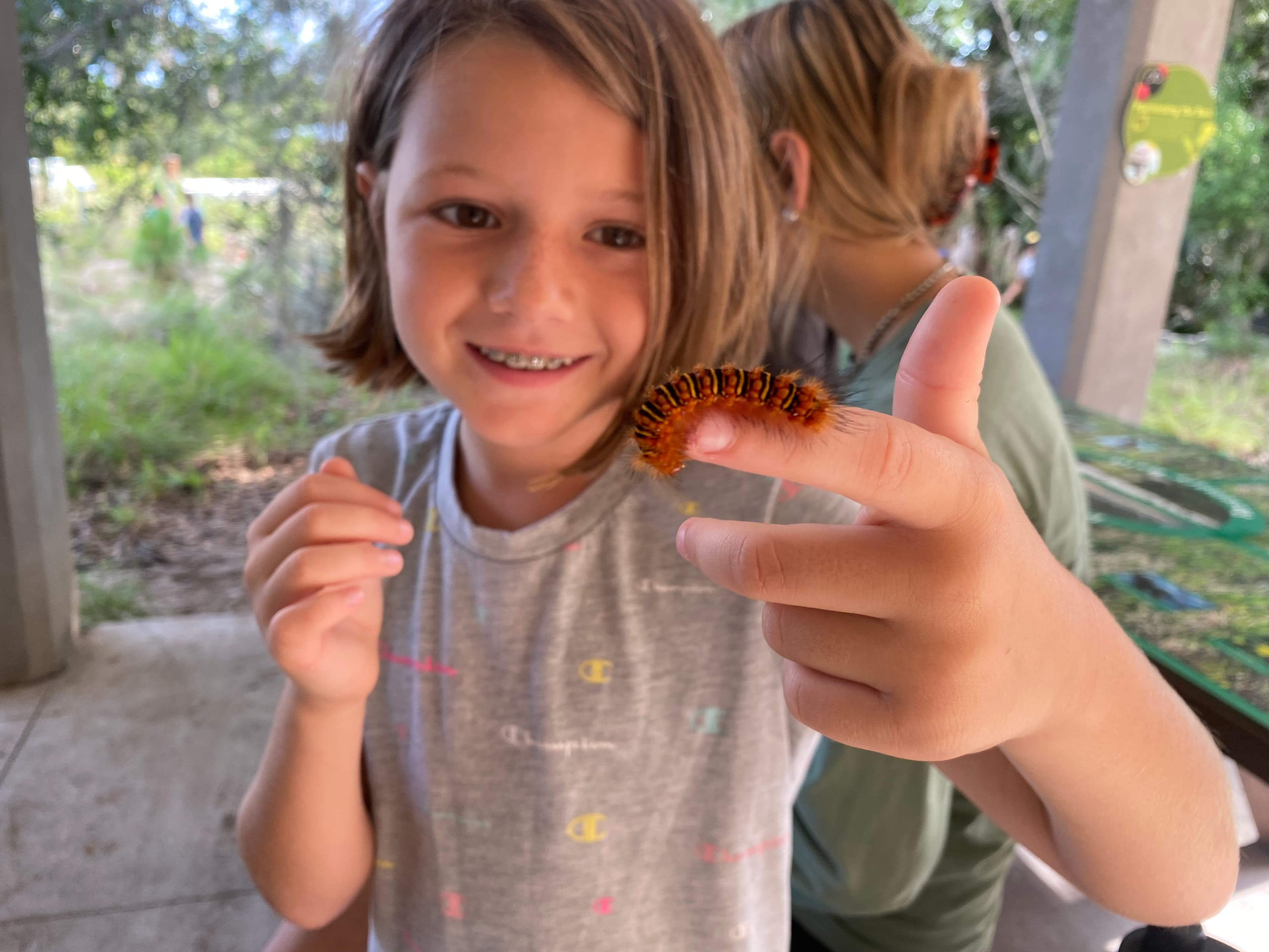 Girl with caterpillar
